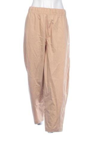 Damskie spodnie sportowe Nike, Rozmiar XL, Kolor Beżowy, Cena 88,90 zł, #137995993
