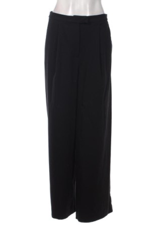 Damskie spodnie H&M, Rozmiar L, Kolor Czarny, Cena 50,81 zł, #138032328