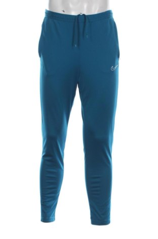 Męskie spodnie sportowe Nike, Rozmiar M, Kolor Niebieski, Cena 186,27 zł, #138001193