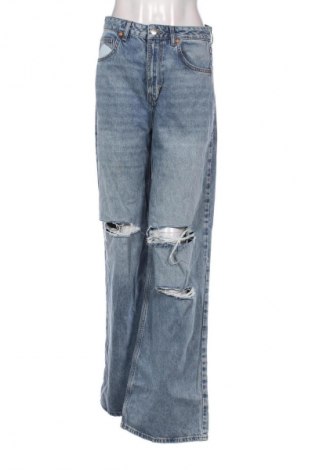 Dámske džínsy  Never Denim, Veľkosť L, Farba Modrá, Cena  23,30 €