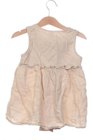 Kinderkleid Tex, Größe 2-3m/ 56-62 cm, Farbe Beige, Preis 1,99 €