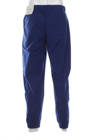 Pánske nohavice  Calvin Klein, Veľkosť M, Farba Modrá, Cena  19,95 €