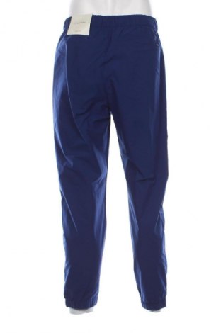 Pantaloni de bărbați Calvin Klein, Mărime M, Culoare Albastru, Preț 116,99 Lei