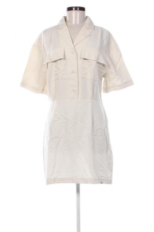 Рокля Calvin Klein Jeans, Размер L, Цвят Бежов, Цена 58,79 €