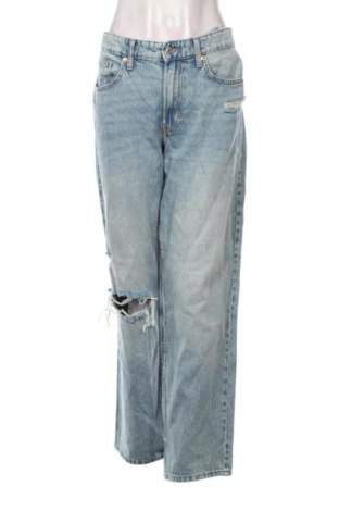 Damskie jeansy H&M, Rozmiar L, Kolor Niebieski, Cena 67,53 zł, #138034989