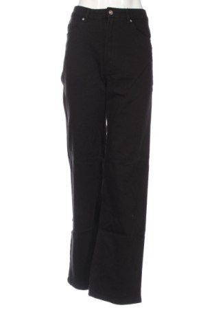 Damskie jeansy H&M, Rozmiar M, Kolor Czarny, Cena 107,66 zł, #138041040