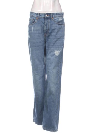 Damskie jeansy Cropp, Rozmiar L, Kolor Niebieski, Cena 71,97 zł, #138058226