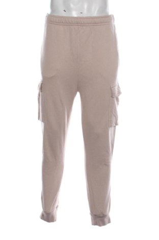 Męskie spodnie sportowe Nike, Rozmiar L, Kolor Popielaty róż, Cena 194,74 zł, #138076265