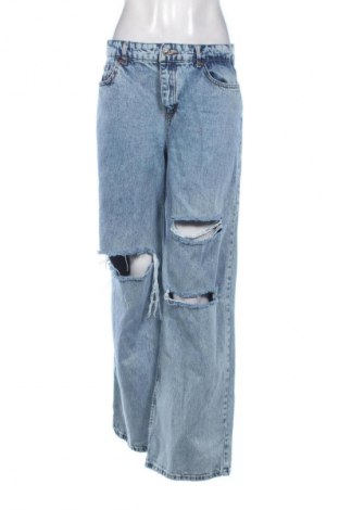 Damskie jeansy Top Secret, Rozmiar L, Kolor Niebieski, Cena 78,99 zł