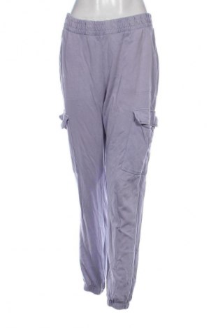 Damskie spodnie sportowe Clockhouse, Rozmiar L, Kolor Fioletowy, Cena 30,00 zł