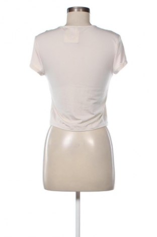 Bluzka damska H&M Divided, Rozmiar L, Kolor Beżowy, Cena 21,99 zł