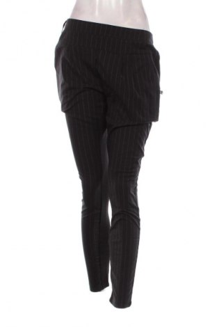 Damskie spodnie Plus Fine, Rozmiar L, Kolor Kolorowy, Cena 27,40 zł