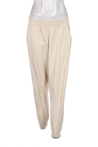 Damskie spodnie Rinascimento, Rozmiar L, Kolor ecru, Cena 18,99 zł