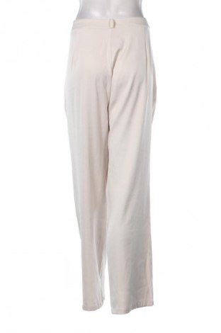 Damskie spodnie Unbranded, Rozmiar XL, Kolor Beżowy, Cena 22,99 zł