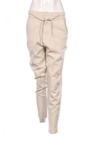 Damskie spodnie Unbranded, Rozmiar S, Kolor Beżowy, Cena 32,14 zł