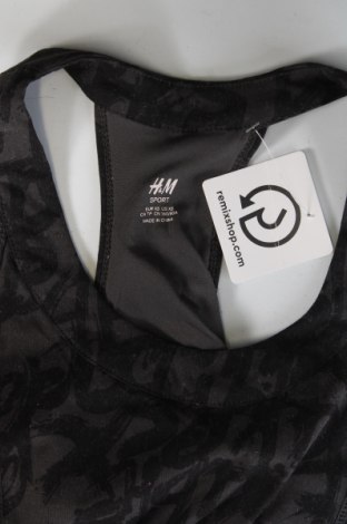 Damski sportowy top H&M, Rozmiar XS, Kolor Kolorowy, Cena 27,40 zł