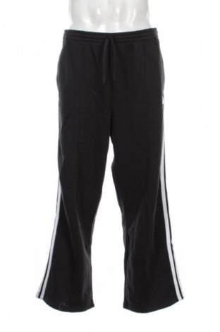Męskie spodnie sportowe Adidas, Rozmiar XL, Kolor Czarny, Cena 125,99 zł