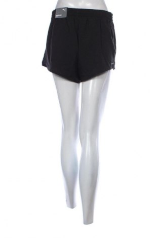Γυναικείο κοντό παντελόνι PUMA, Μέγεθος M, Χρώμα Μαύρο, Τιμή 10,99 €