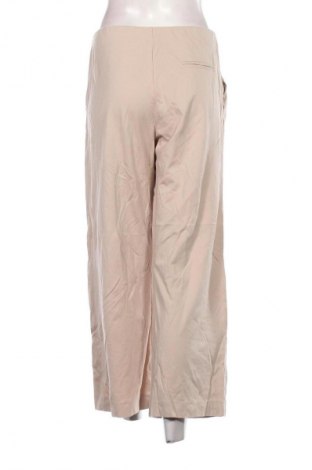 Női nadrág Unbranded, Méret L, Szín Ekrü
, Ár 1 019 Ft