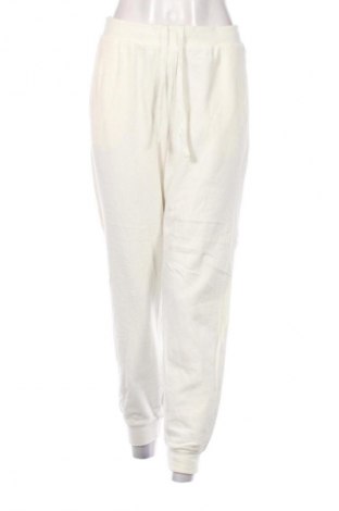 Дамско спортно долнище Uniqlo, Размер M, Цвят Екрю, Цена 11,24 €