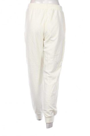 Дамско спортно долнище Uniqlo, Размер M, Цвят Екрю, Цена 11,24 €