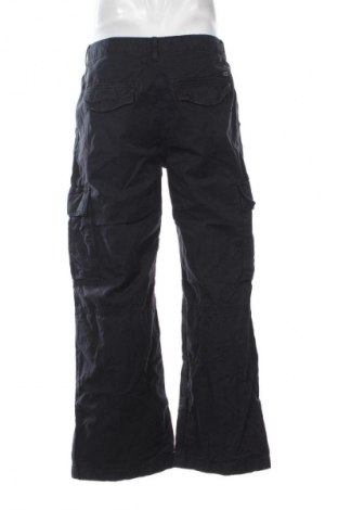 Pánské kalhoty  Tommy Jeans, Velikost L, Barva Modrá, Cena  2 799,00 Kč