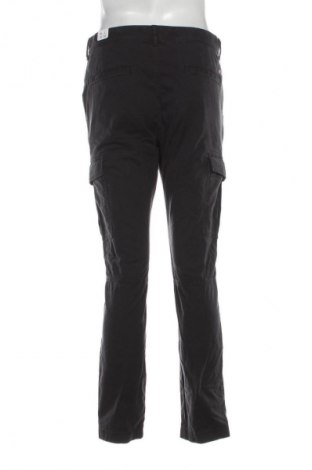 Pánské kalhoty  Tommy Jeans, Velikost M, Barva Černá, Cena  989,00 Kč