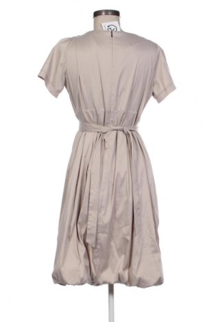 Kleid Unbranded, Größe L, Farbe Beige, Preis 23,99 €