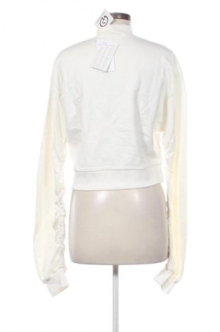 Bluzka damska Reebok, Rozmiar XXS, Kolor ecru, Cena 61,99 zł