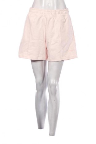 Γυναικείο κοντό παντελόνι New Balance, Μέγεθος M, Χρώμα Ρόζ , Τιμή 30,99 €