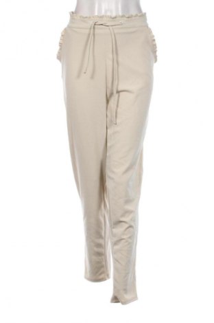 Damskie spodnie Janina, Rozmiar XL, Kolor Beżowy, Cena 36,99 zł