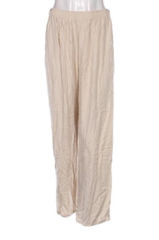 Damskie spodnie NEW COLLECTION, Rozmiar S, Kolor Beżowy, Cena 32,99 zł