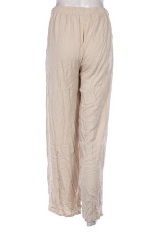 Damskie spodnie NEW COLLECTION, Rozmiar S, Kolor Beżowy, Cena 32,99 zł