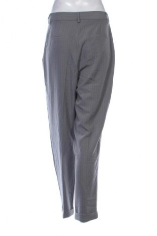 Damskie spodnie Sinsay, Rozmiar L, Kolor Kolorowy, Cena 19,99 zł