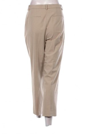 Dámské kalhoty  Uniqlo, Velikost XL, Barva Béžová, Cena  179,00 Kč