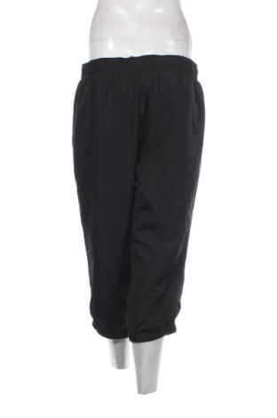 Damskie spodnie sportowe Crane, Rozmiar M, Kolor Czarny, Cena 6,99 zł