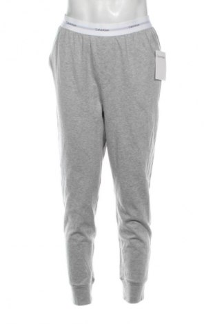 Pánské tepláky  Calvin Klein, Velikost M, Barva Šedá, Cena  1 079,00 Kč