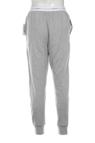 Pánské tepláky  Calvin Klein, Velikost M, Barva Šedá, Cena  1 079,00 Kč