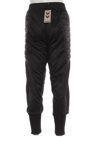 Męskie spodnie sportowe Hummel, Rozmiar M, Kolor Czarny, Cena 42,99 zł