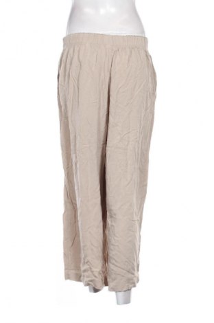 Damskie spodnie H&M, Rozmiar M, Kolor Beżowy, Cena 19,99 zł