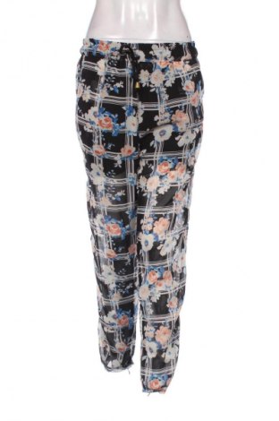 Damskie spodnie Madonna, Rozmiar M, Kolor Kolorowy, Cena 23,63 zł