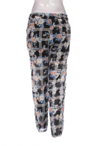 Damskie spodnie Madonna, Rozmiar M, Kolor Kolorowy, Cena 23,63 zł