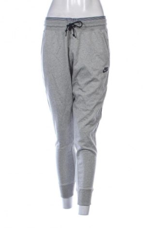 Γυναικείο αθλητικό παντελόνι Nike, Μέγεθος L, Χρώμα Πολύχρωμο, Τιμή 25,99 €