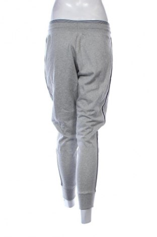 Γυναικείο αθλητικό παντελόνι Nike, Μέγεθος L, Χρώμα Πολύχρωμο, Τιμή 25,99 €