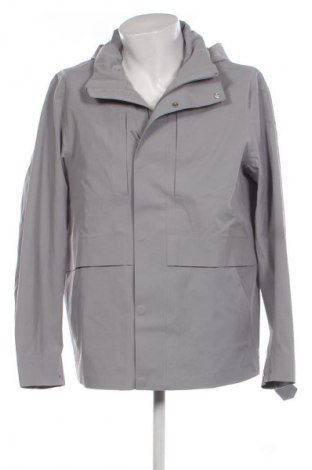 Ανδρικό μπουφάν Calvin Klein, Μέγεθος M, Χρώμα Γκρί, Τιμή 144,99 €