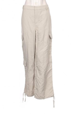 Damskie spodnie H&M, Rozmiar XL, Kolor Beżowy, Cena 17,99 zł