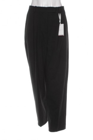 Damskie spodnie Tommy Hilfiger, Rozmiar L, Kolor Czarny, Cena 88,99 zł, #134841555