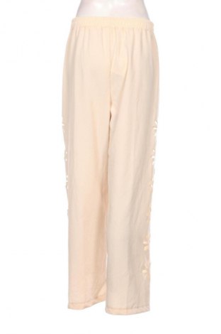 Damskie spodnie Unbranded, Rozmiar M, Kolor Beżowy, Cena 12,99 zł