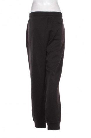 Pantaloni trening de femei Tommy Hilfiger, Mărime XL, Culoare Negru, Preț 259,99 Lei