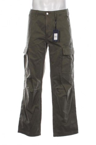 Męskie spodnie Tommy Jeans, Rozmiar L, Kolor Zielony, Cena 346,99 zł